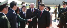 President of the Republic of Belarus Alexander Lukashenko welcomes President of the People’s Republic of China Xi Jinping at the National Airport Minsk, 10 May 2015