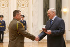 Head of the main department of the State Security Committee of Belarus Dmitry Reutsky is honored with the Order for Service to the Homeland 3 Class