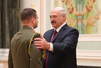 Captain Oleg Boinichev from the Emergencies Ministry is honored with the Order for Personal Courage