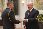 Aleksandr Lukashenko presents general’s shoulder boards to head of the Interior Affairs Department of the Mogilev Oblast Executive Committee Igor Shcherbachenya