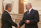 Alexander Lukashenko presents the diploma of the NASB member to head of the department for polymer compound technologies of the NASB Institute of Mechanics of Metal-Polymer Systems Stepan Pesetsky