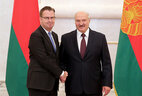 Belarus President Aleksandr Lukashenko and Head of the Delegation of the European Union to Belarus Dirk Schuebel