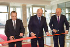 Chairman of the Supreme Court Valentin Sukalo, Belarus President Aleksandr Lukashenko and Chairman of the Minsk City Hall Anatoly Sivak cut the ribbon to inaugurate a new building of Belarus' Supreme Court