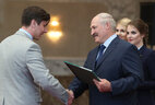 Graduate of the Francysk Skaryna Gomel State University Vyacheslav Murashko receives the President's letter of commendation