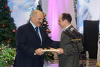 The Belarus President’s ice hosckey players are officially thanked by Alexander Lukashenko for the victory at the 12th Christmas International Amateur Ice Hockey Tournament. The award is presented to Roman Salnikov