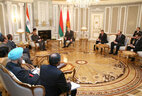 At the meeting with Indian President Pranab Mukherjee