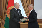 Letter of commendation from the President of Belarus is given to chief coach of the women’s weightlifting team Valentin Korotkin