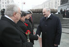 Head of state Alexander Lukashenko greets representatives of diplomatic missions who take part in the ceremony
