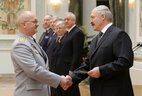President of Belarus Alexander Lukashenko presented general’s shoulder straps to senior officers at a meeting with top officers of the Armed Forces and law enforcement bodies. Shoulder straps of the major general of justice are bestowed upon colonel of justice Valery Gaiduchenok