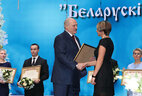 Belarusian Sport Olympus Award is presented to Olga Vlasova, the chief coach of the Belarusian national trampoline team