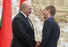 Alexander Lukashenko confers the Order of Fatherland 3rd Class on Olympic champion Anton Kushnir