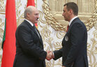 Alexander Lukashenko presents the Order of Fatherland 3rd Class to chief coach of the Belarusian biathlon team Andrian Tsibulsky