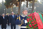 Belarus President Alexander Lukashenko lays a wreath at the Tomb of Azerbaijan’s national leader Heydar Aliyev in the Alley of Honor in Baku