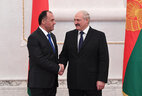 Belarus President Alexander Lukashenko and Ambassador Extraordinary and Plenipotentiary of Tajikistan to Belarus Mahmadsharif Hakdod