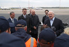 Aleksandr Lukashenko talks to workers at Minsk National Airport