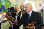 Alexander Lukashenko is shown musical instruments