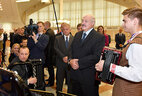 Alexander Lukashenko is shown musical instruments