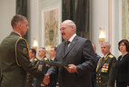 Graduate of the Command and Staff Department of the Military Academy Artyom Mikulchik receives a letter of commendation from the President