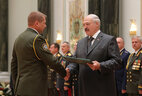 Graduate of the General Staff Department of the Military Academy Igor Zolotar receives a letter of commendation from the President