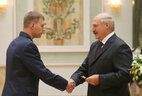 Sergei Azemsha receives shoulder boards of the state advisor of justice 3rd class