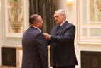 Chairman of the Grodno Oblast department of the State Control Committee (2013-2016) Vasily Gerasimov receives the Order of Honor