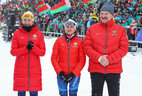 Belarus President Alexander Lukashenko and Olympic champions Dzinara Alimbekava and Iryna Kryuko