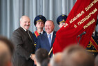 Alexander Lukashenko gives OAO Savushkin Product the Honorary State Banner of the Republic of Belarus for the economic excellence