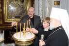 The head of state lit a candle for the Icon of the Mother of God of Minsk together with his younger son Nikolai