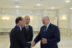 Belarus President Aleksandr Lukashenko and UK Trade Policy Minister George Hollingbery