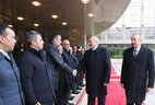 Belarus President Alexander Lukashenko and Azerbaijan President Ilham Aliyev welcome the members of the delegations