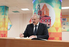 Alexander Lukashenko signs the Book of Distinguished Guests