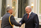 First Deputy Head of the Interior Ministry Academy Alexei Bashan receives the Honored Worker of Law Enforcement Bodies of Belarus title