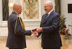 Grigory Labkov, First Deputy Head of the Main Department for Combating Organized Crime and Corruption at the Interior Ministry, receives the Order For Service to the Homeland 3rd Class