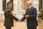 Oleg Mishchenko, Chief Engineer of the Communication Division of the General Staff of the Armed Forces, receives the Order For Service to the Homeland 3rd Class