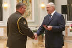 Deputy Chief of the General Staff of the Armed Forces of Belarus Pavel Muraveiko receives the Order For Service to the Homeland 3rd Class