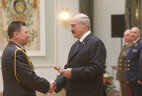 Alexander Lukashenko presents shoulder boards of major general of police to Viktor Dubovets
