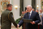 Letter of commendation from the Belarusian President is presented to graduate of the Department of the General Staff of the Armed Forces of the Military Academy lieutenant colonel Valery Bulygo