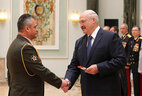 Major general’s shoulder boards are presented to Oleg Mishchenko, chief of communications of the Armed Forces – head of the Communications Department of the General Staff