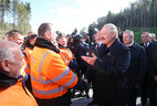 Alexander Lukashenko meets with workers at the construction site of the second ring road around Minsk