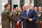 Letter of commendation from the Belarusian President is presented to graduate of the Department of the General Staff of the Armed Forces of the Military Academy lieutenant colonel Sergei Gudozhnikov