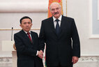 Belarus President Alexander Lukashenko and Ambassador Extraordinary and Plenipotentiary of Laos to Belarus with concurrent accreditation Siviengphet Phetvorasack