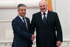 Belarus President Alexander Lukashenko and Ambassador Extraordinary and Plenipotentiary of Uzbekistan to Belarus Bahrom Ashrafhanov