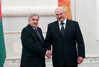 Belarus President Alexander Lukashenko and Ambassador Extraordinary and Plenipotentiary of Uruguay to Belarus with concurrent accreditation Enrique Juan Delgado Genta