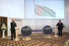 Alexander Lukashenko and Gurbanguly Berdimuhamedow press a symbolic button to inaugurate the plant
