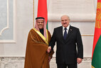 Belarus President Aleksandr Lukashenko and Ambassador Extraordinary and Plenipotentiary of Bahrain to Belarus Ahmed Al Saati