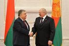 Belarus President Alexander Lukashenko and Ambassador Extraordinary and Plenipotentiary of Azerbaijan to Belarus Latif Gandilov