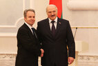 Belarus President Alexander Lukashenko and Ambassador Extraordinary and Plenipotentiary of Greece to Belarus Andreas Friganas