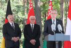 Belarus President Alexander Lukashenko, German President Frank-Walter Steinmeier and Austrian President Alexander Van der Bellen while a commemorative ceremony