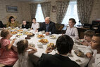 Alexander Lukashenko visits the Novikov family