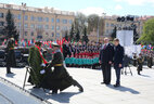During the ceremony at the Victory Square